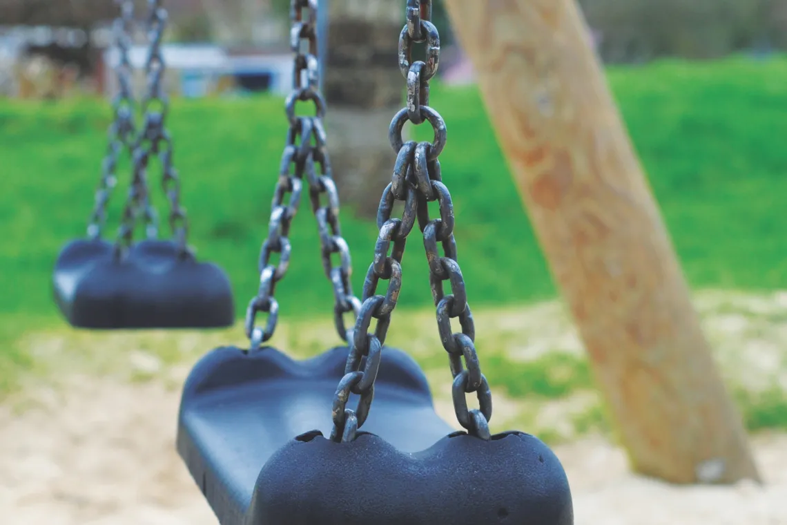 Empty swings at park Empty swings at park