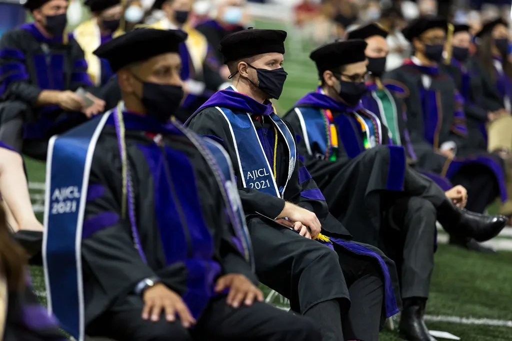 Students sitting at 2021 Arizona Law commencement Students sitting at 2021 Arizona Law commencement